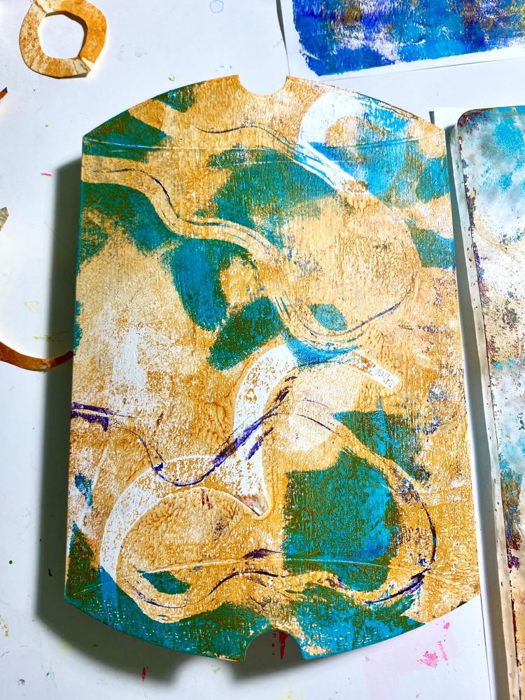 Gelli-printing and monoprinting on a pillow box with masks 
