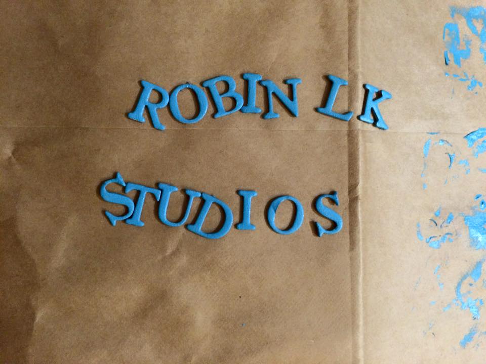 Sign: RobinLK Studios