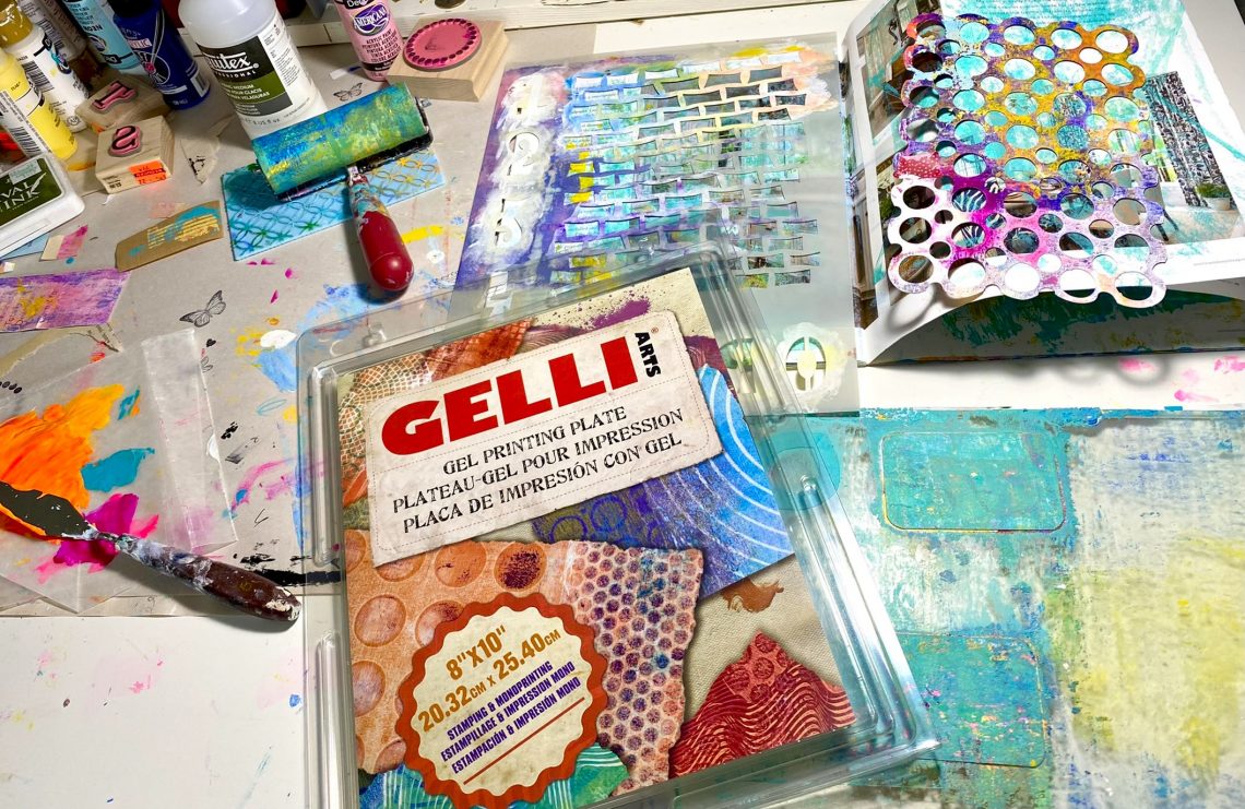 Gelli Arts brand gelli plate and tools on an art table
